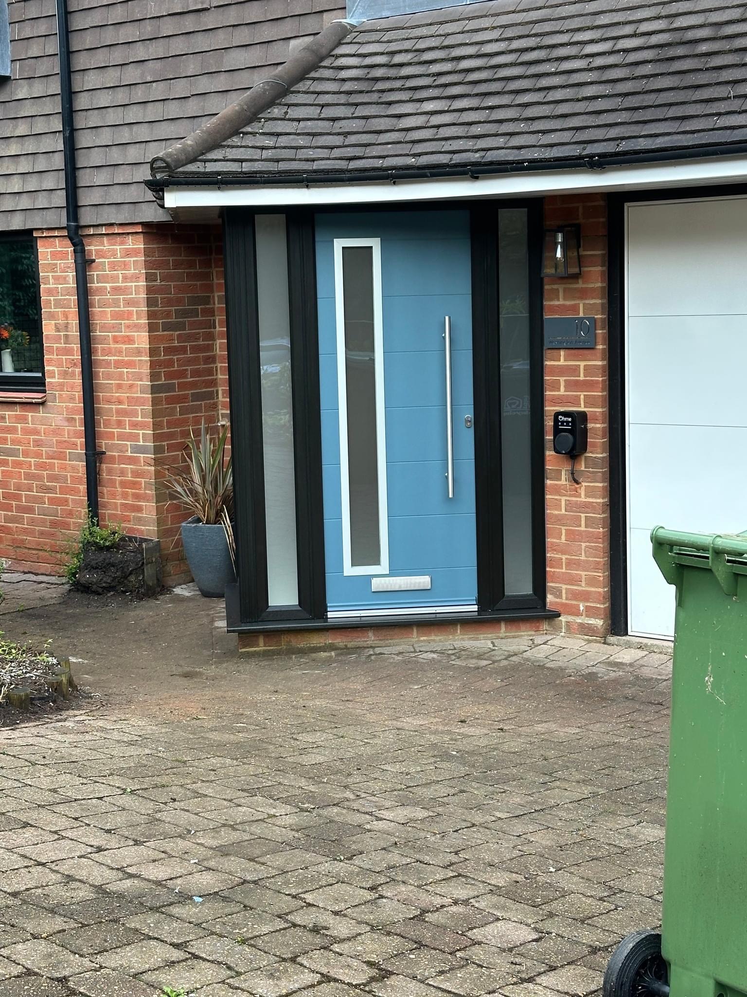 Image of the final result, a modern blue door