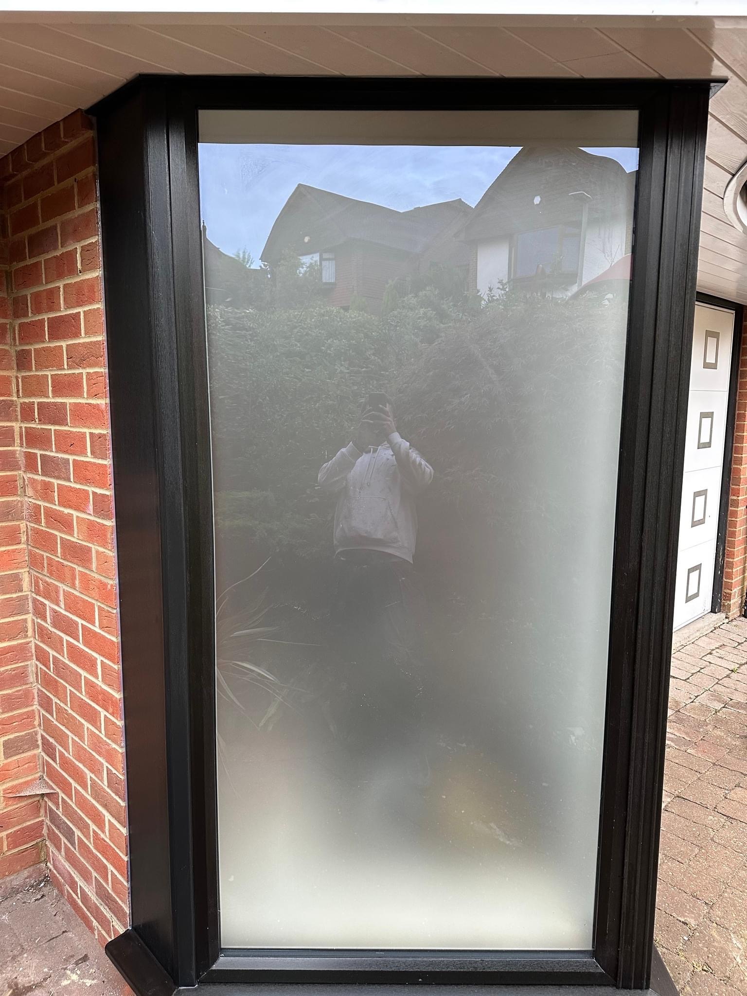 The floor to ceiling glass panel